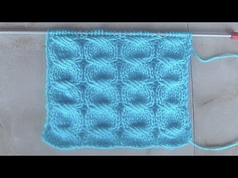 Видео: Узор из косичек с ажурным переплетением Вязание спицами Видеоурок 192