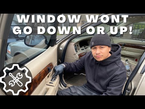 Видео: Ремонт застрявшего окна: замена стеклоподъемника на Mercury Grand Marquis