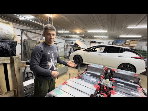 Видео: Замена высоковольтной батареи на Nissan Leaf ZE1 из Японии в Москве т. +7 926 532-26-98 Николай