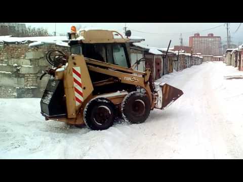 Видео: Пум 500 погрузчик