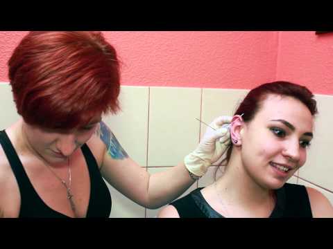 Видео: Пирсинг уха | Ear peirsing | TATTOO DRAGON