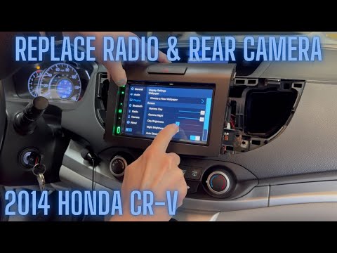 Видео: Как заменить магнитолу и камеру заднего вида - Honda CR-V 2014 года