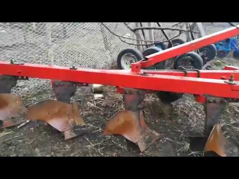 Видео: Регулировка плуга плн 5-35