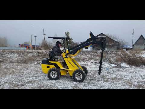 Видео: Ямобур для мини погрузчика. Обзор гидробура.