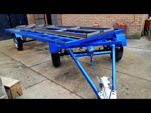 Видео: Прицеп с поворотной осью, ВЫКОТНЫМИ РЯДАМИ. Часть 1
