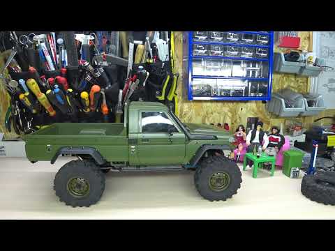 Видео: Traxxas trx4 Upgrade. Установка кузова Killerbody Toyota land Cruiser 70.