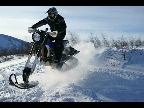 Видео: Сноубайк - смотрим, что может. ЭНДУРО на гусенице | SNOWBIKE