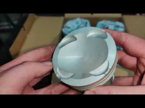 Видео: Mazda 626 ge Обзор новых недорогих поршней teikin. Вероятная причина дыма на холодную и жора масла.