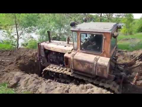 Видео: ДТ 75  Ремонт дамбы.