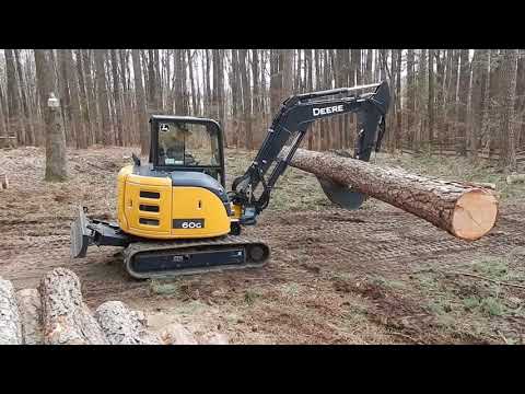 Видео: Мини-экскаваторы John Deere и Kubota: битва!