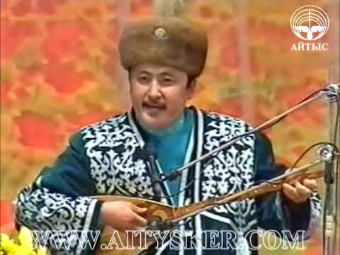 Видео: Бекарыс Шойбеков пен Аманжол Әлтаевтың айтысы. 2000 ж.