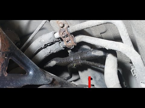 Видео: Mitsubishi Pajero 4 замена трубок 2 контура кондиционера.