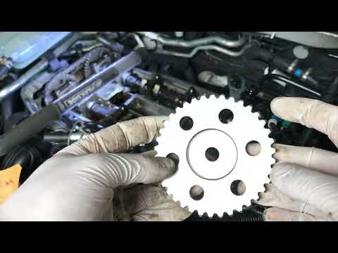 Видео: Замена цепи ГРМ и масляного насоса на бензиновом двигателе Volvo V50 2.0 [Часть 1]