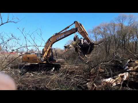 Видео: Расчистка участка экскаватором