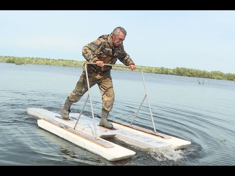 Видео: Пешком по воде: вартовчанин пересёк Обь на водных лыжах собственного изобретения