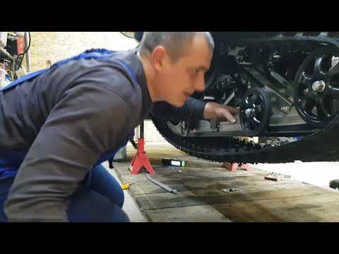 Видео: Yamaha Viking 540 (замена склиз,регулировка натяжки гусеницы)