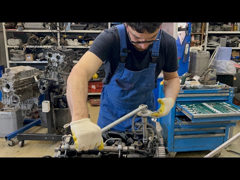 Видео: VOLVO DRIV-e Diesel 2,0 инструкция №3 по сборке мотора - установка коллектора и форсунок.