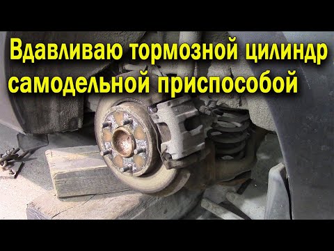 Видео: Замена задних тормозных колодок на #Мазда 3.How to Replace Rear Brakes 06-13 Mazda 3