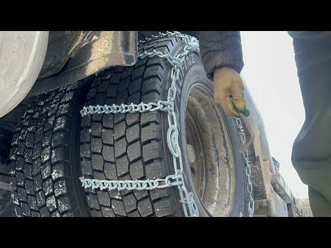 Видео: Как быстро надеть цепи на подъёме