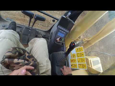 Видео: Ознакомление с экскаватором Kamatsu 300 2011 года