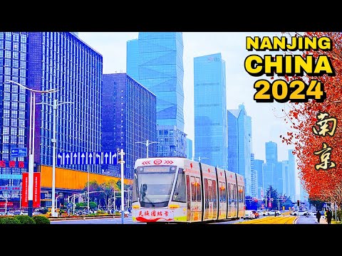 Видео: Удивительное городское строительство в Китае! Сядьте на трамвай, чтобы посетить новый город Нанкин