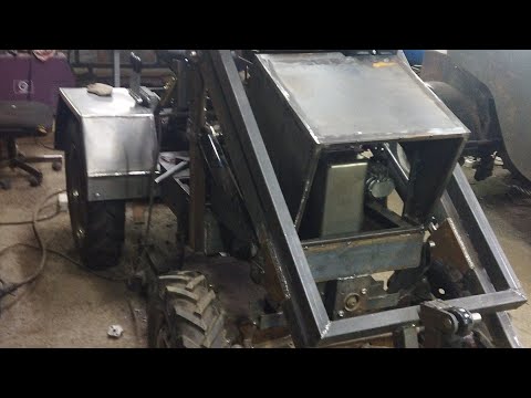 Видео: минитрактор классической компоновки на цельной раме продолжение.