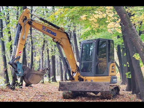 Видео: Работа на мини экскаваторе XCMG XE55U