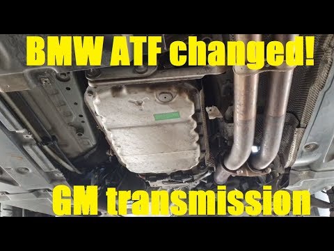 Видео: Замена трансмиссионной жидкости и фильтра GM GA6L45R на BMW 328i! (как)