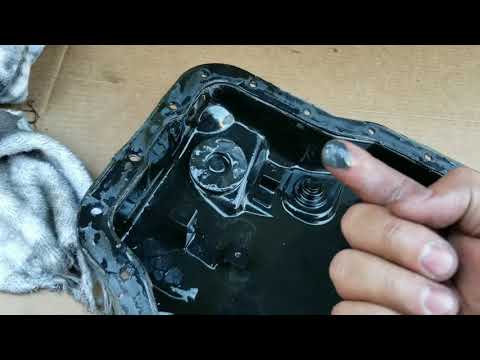 Видео: Как заменить трансмиссионную жидкость и фильтр на Mazda 3 2011 2.0l