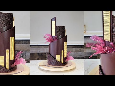 Видео: Не можете темперировать шоколад? Не проблема! | Абстрактная современная асимметричная шоколадная ...