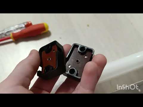 Видео: Замена стартëров держателей и лампа держателя 