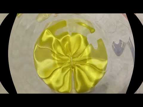 Видео: Солнечный бантик из атласных лент 