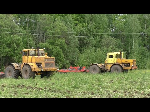 Видео: Кировцы К-701 дискуют поле! John Deere 8335R и Lemken Diamant 16.