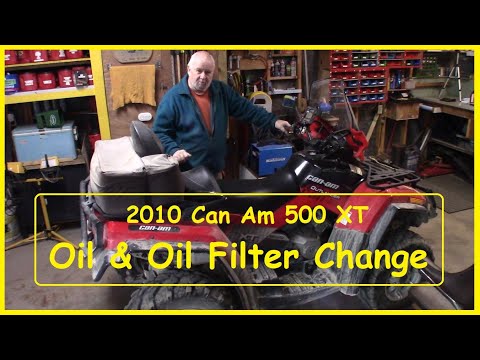 Видео: Замена масла и фильтра Can Am 500 XT Max 2010 года
