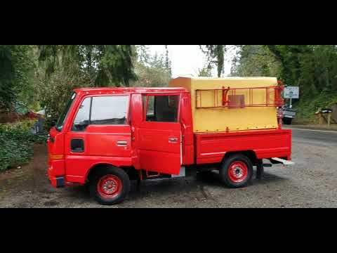 Видео: 1987 Nissan Atlas W-Cab fire truck only 4450km (по-русски) engine Z16S