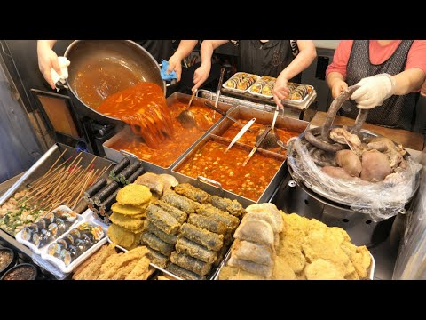 Видео: Комплексные закуски, острые ттокбокки, мороженое с фруктами - корейская уличная еда.