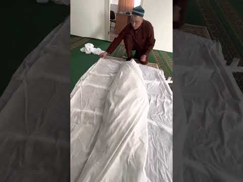 Видео: Әйел адамды кебіндеу