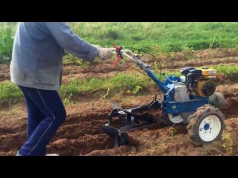 Видео: Поворотный плуг для мотоблока