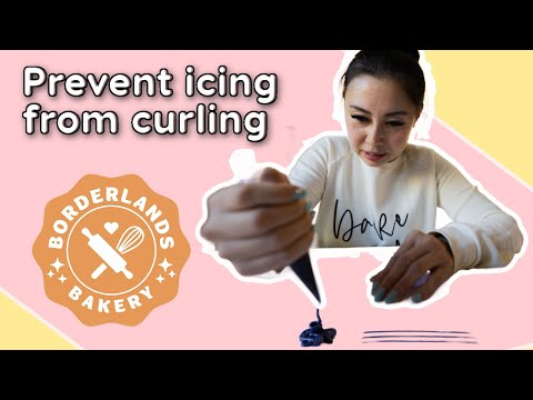 Видео: Как предотвратить скручивание тонких линий королевской глазури