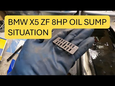 Видео: BMW X5 (E70) 2013 года. Самостоятельная замена масла в коробке передач и тяги стабилизатора попер...