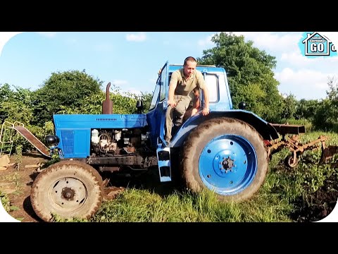 Видео: Підгортання картоплі трактором МТЗ 80