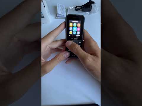 Видео: Распаковка телефона Alcatel 1066D