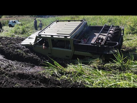 Видео: Unimog + Газ66 в болоті оффроад