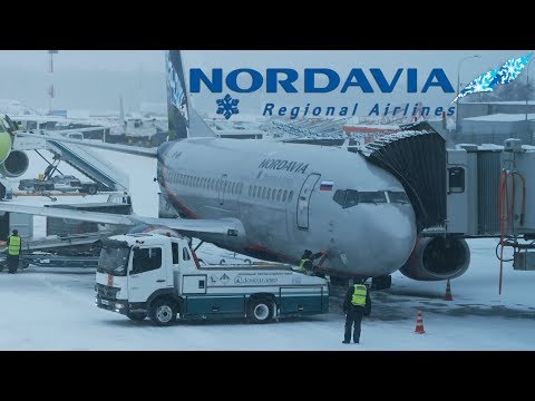 Видео: Снежный взлет | Нордавиа Boeing 737-500 | Москва - Архангельск