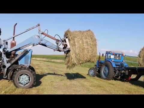 Видео: Сбор тюков сена.