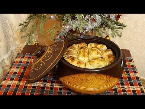 Видео: Зелеви сарми със стафиди в гювеч