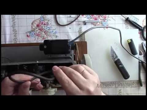 Видео: Как поставить кожаный ремень на швейную машину с электроприводом. Видео №77.