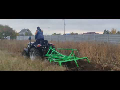 Видео: Мінітрактор з дисковою бороною, за дисковує бур'яни. 