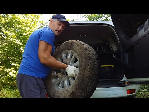 Видео: Как снять запаску на Toyota Prado 150