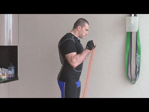 Видео: Сгибание рук с резиной  «молот»: техника и нюансы